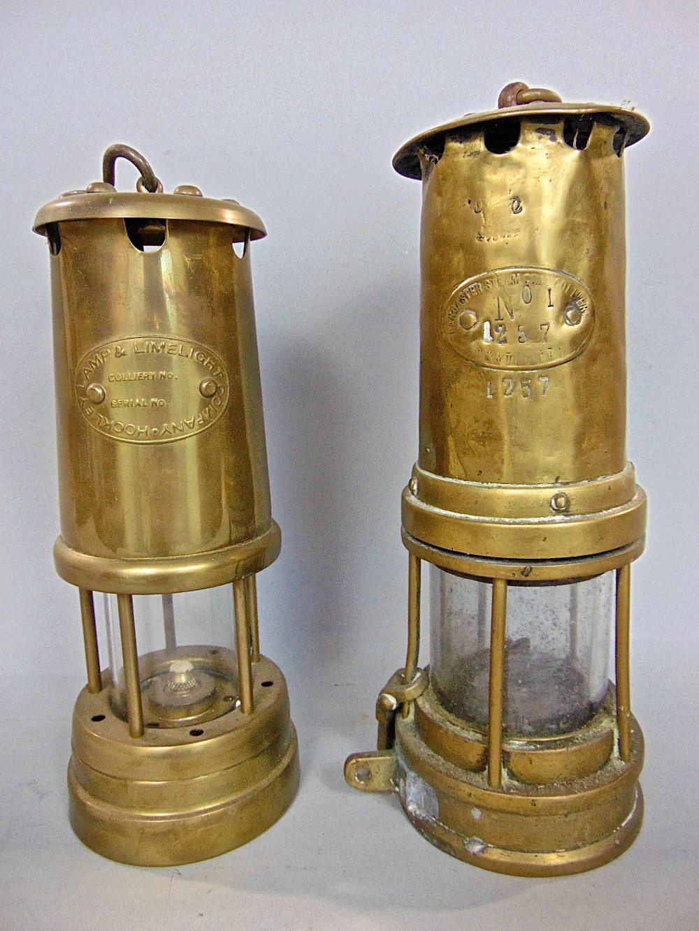 Two brass miners lamps marked Lancaster Steam Co Colliery and Hockley Lamp and Limelight Co (2)