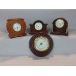 Three early 20th century oak cased mantle clocks, all in architectural cases with platform and