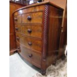 A Victorian mahogany bow fronted bedroom chest of three long and two short graduated drawers with