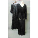 Two full length 1930s evening dresses. One sleeveless with crepe body and black lace godet skirt and