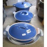 A Le Creuset two handled saucepan and banded lid, together with three others, all in blue