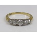 A graduated five stone diamond ring in 18ct gold, size L, 2.5g