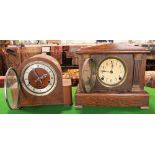 Two vintage oak wall clocks, one in an architectural case, the other a three train Napoleon hat