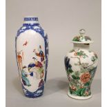 A 19th century oriental vase and cover of shouldered form with famille vert decoration of