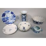 A collection of mainly 19th century continental tin glazed earthenwares, with blue and white painted