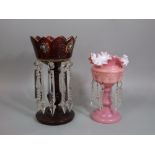 Two various Victorian glass lustres with prismatic drops, one in cranberry glass, the other in