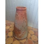 An old weathered terracotta conical shaped rhubarb forcer, 66 cm high approx
