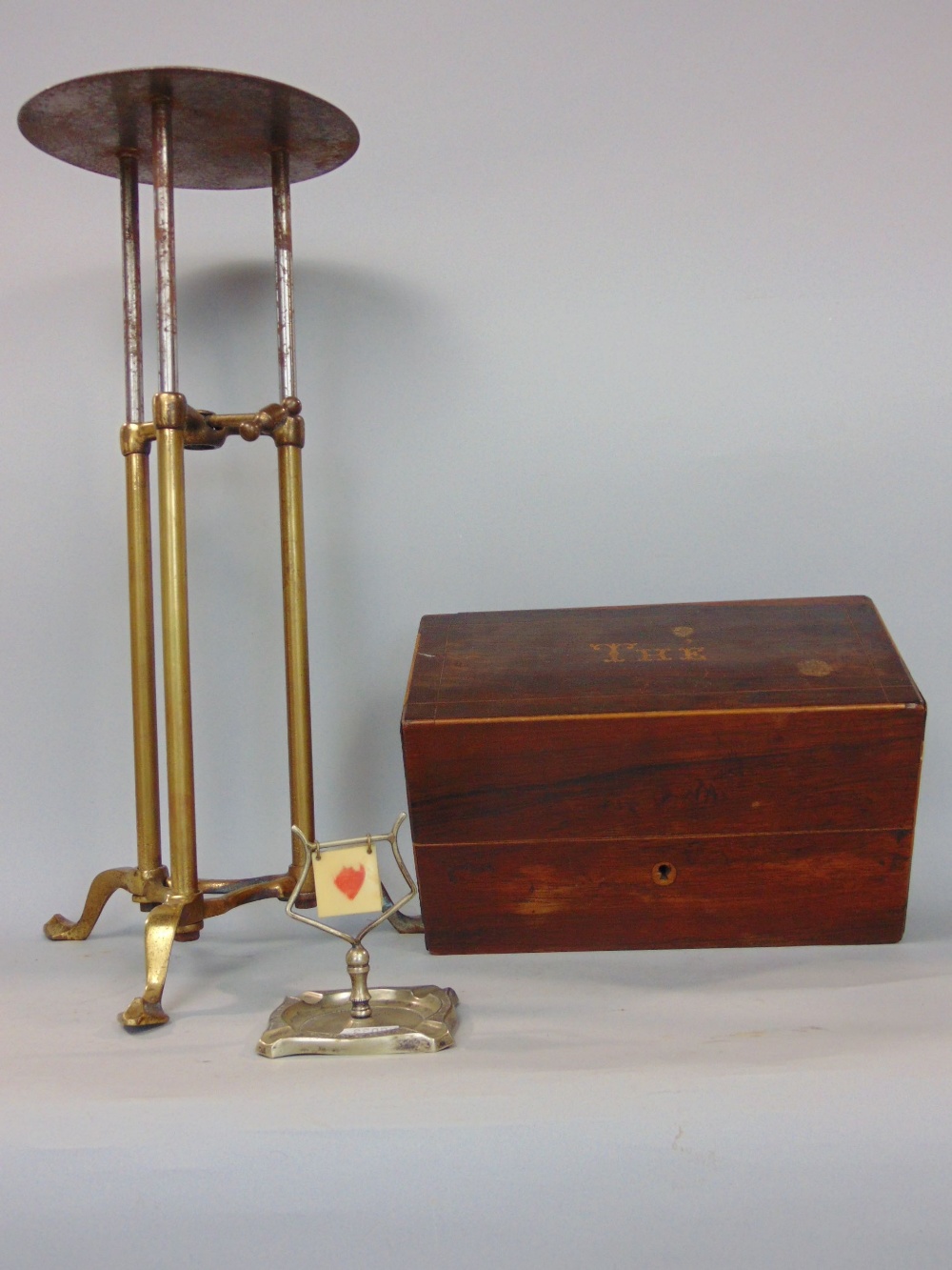 Interesting telescopic brass shop display stand in the manner of Benson, 43cm high (adjustable);