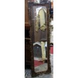 A good quality overmantle/full length wall mirror of rectangular form, the gilt frame with carved