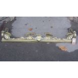 A good quality heavy cast brass/possibly bronze fender with scrolled and fluted detail, 132 cm