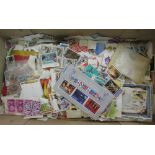 A box containing a large quantity of unused mint stamps