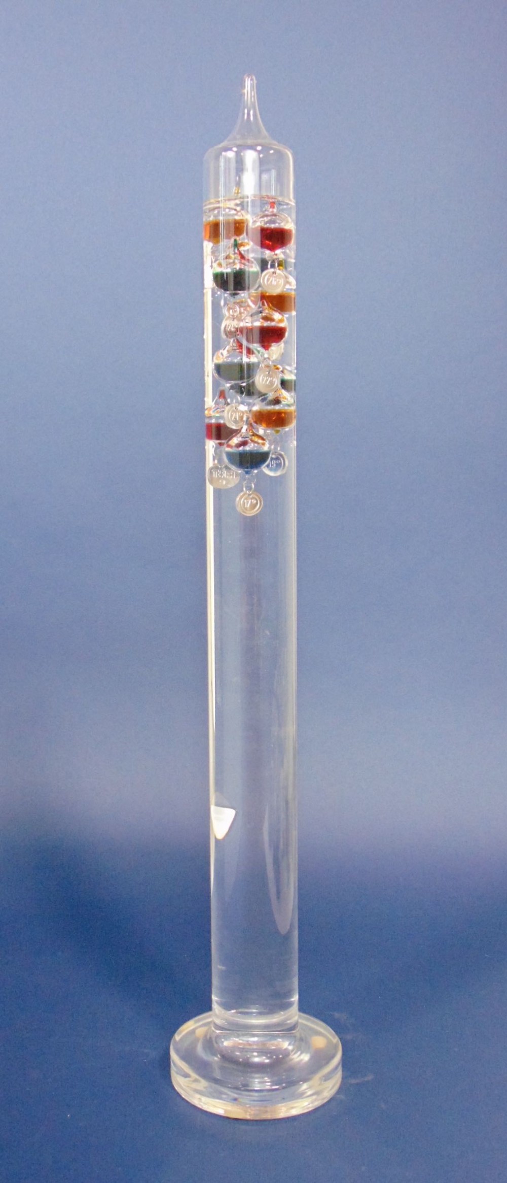Interesting Galileo glass thermometer fitted with various smaller glass balls, filled with
