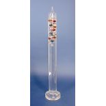 Interesting Galileo glass thermometer fitted with various smaller glass balls, filled with