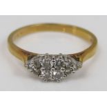 An 18ct diamond cluster ring of tapered form, size M/N, 2.6g