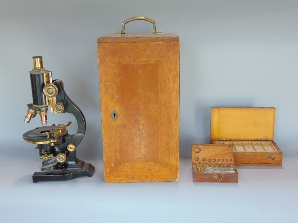 An interesting laboratory lot to include a good cased Leitz microscope, with lenses and