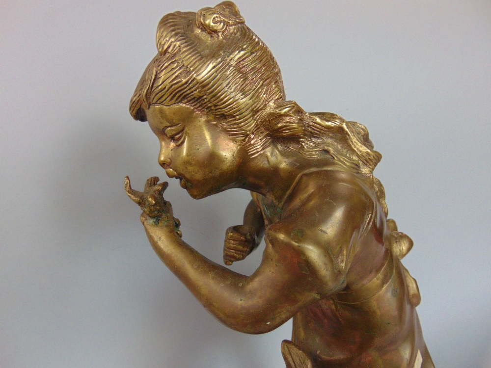 Gilt bronze study of a standing girl holding a bird, 40cm high - Image 3 of 3