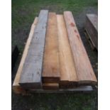 Nine lengths of soft wood mill sawn timber, various depths, but approx 217 cm x 23 cm wide