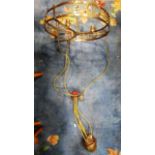 An Edwardian brass rise and fall ceiling light, the strapped hoop with classical laurel and