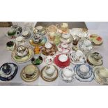 A quantity of decorative tea ware trios comprising Royal Doulton, Melba china, Royal Albert, Clarice