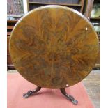 A mid-Victorian period mahogany centre table, the circular top with well matched segmented flamed