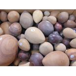A collection of carved treen eggs