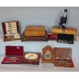 A box of interesting items to include a students microscope, an Elliot miniature bracket type clock,