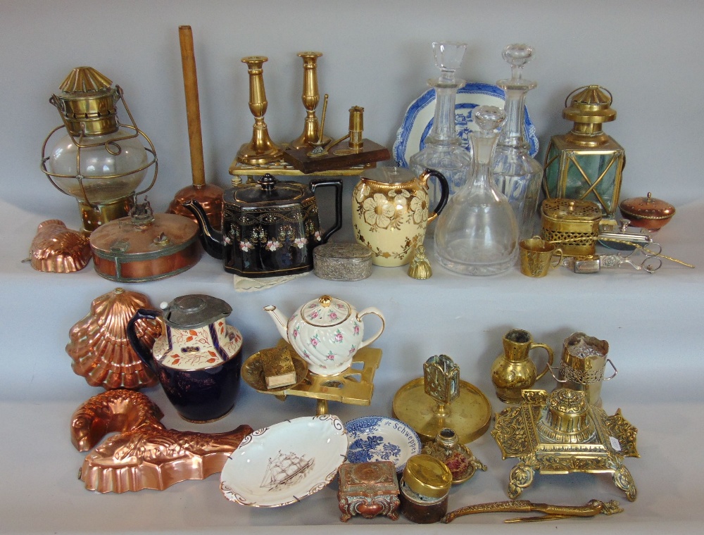 A mixed collection of miscellaneous items to include copper jelly moulds, various brassware, glass