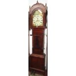 A 19th century mahogany longcase clock with spiral column supports beneath an arched frieze,