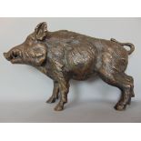 A bronze study of a standing boar/warthog, 29cm long