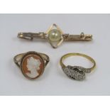 An 18ct three stone diamond ring, size K/L, together with a 9ct cameo ring depicting a lady, size J;