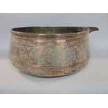 Antique Persian copper bowl, engraved with various Islamic panels, with spout, 30cm diameter