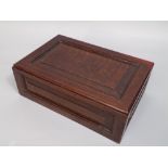 A small 19th century panelled oak box, 31 cm max