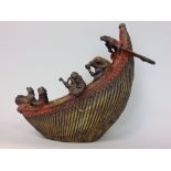 Interesting cast metal (possibly bronze) figural study of a frog band on a long ship, with