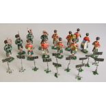 A lead Highland Regimental band 6.5 cm high standing, 15 soldiers and 12 music stands