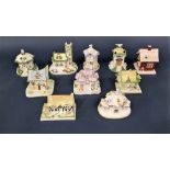 A collection of ten Coalport model houses including a Country Cottage, Red House, Dove Cote, etc