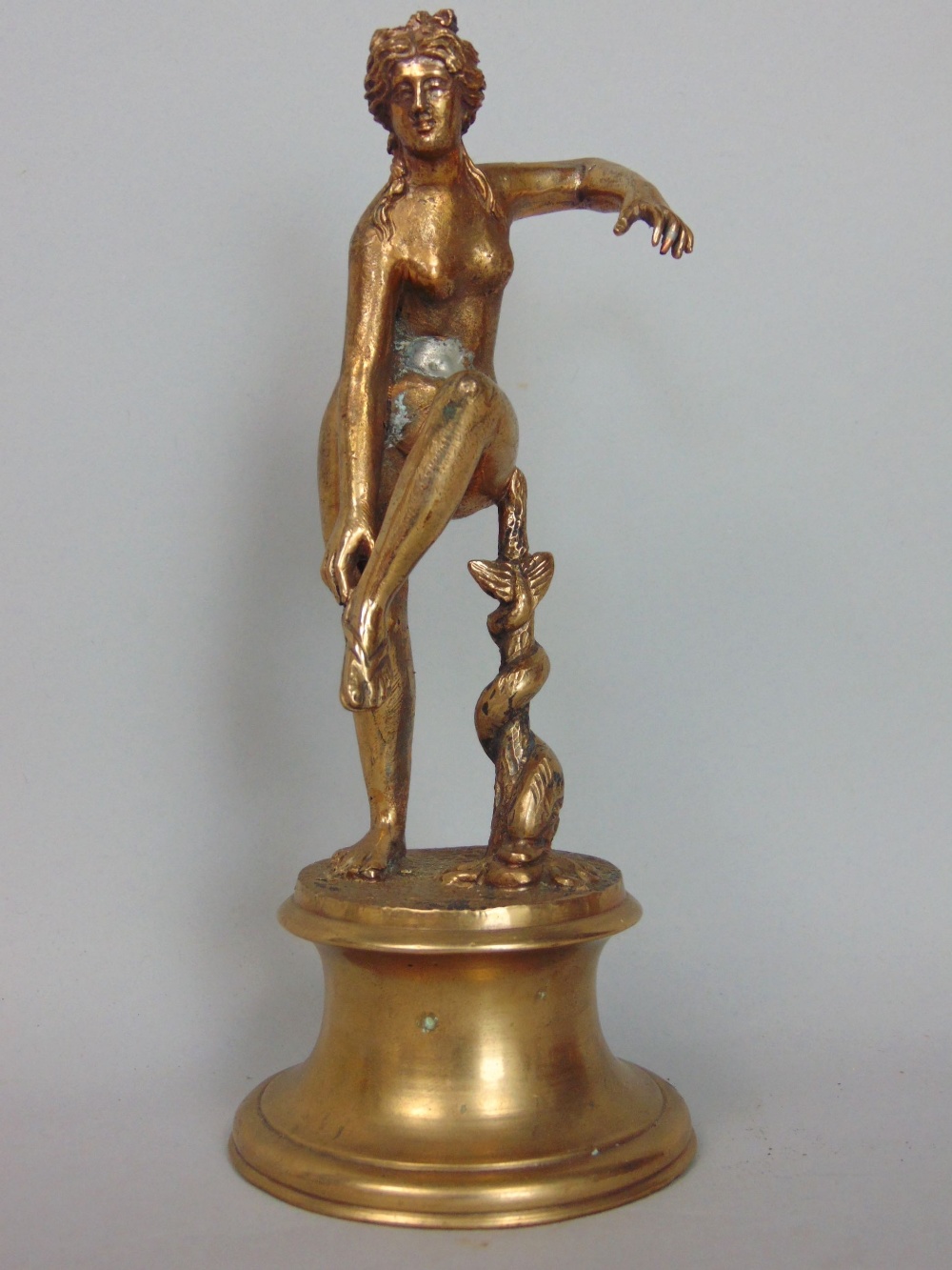 Antique continental cast brass twin branch figural candlestick, 23cm high, together with two gilt - Image 3 of 5