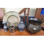 A 19th century bronze cauldron on three short supports, a German brass alms dish, with trailing