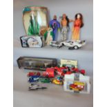 A box of various Barbie Dolls, together with a boxed Corgi Classic James Bond car and others