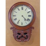 19th century mahogany two train drop dial wall clock, the circular dial over a carved acanthus and