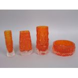 Four pieces of Geoffrey Baxter Whitefriars tangerine glass to include three vases and a shallow