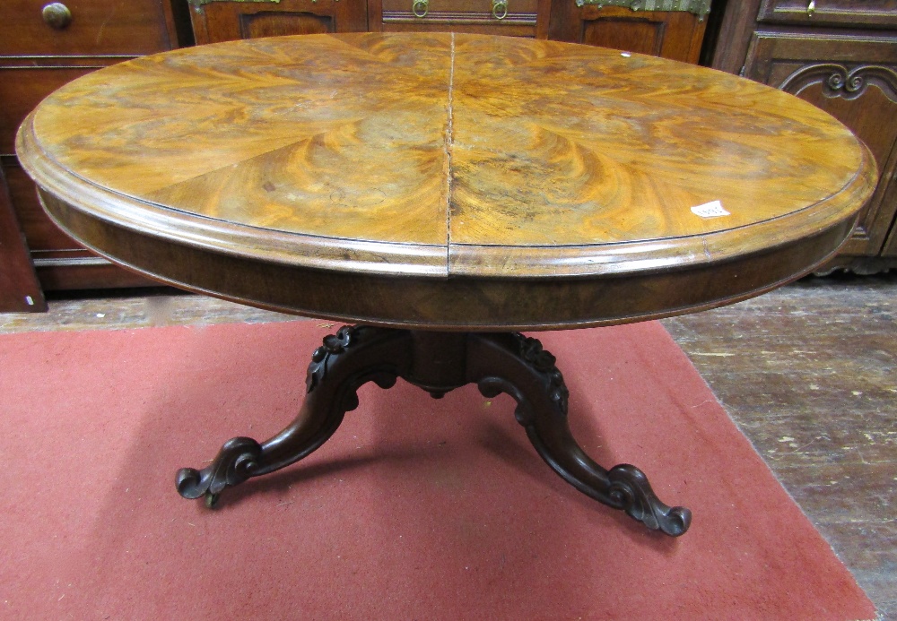 A mid-Victorian period mahogany centre table, the circular top with well matched segmented flamed - Image 2 of 3