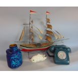 Vintage GPO telephone in teal, together with a scale tin model of a ship, a Brest German vase and