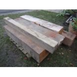 Five mill cut soft wood blocks approx 180 cm long x 28 cm wide x 25 cm deep, together with two