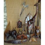 A collection of African treen carvings to include tribesmen, animals, etc