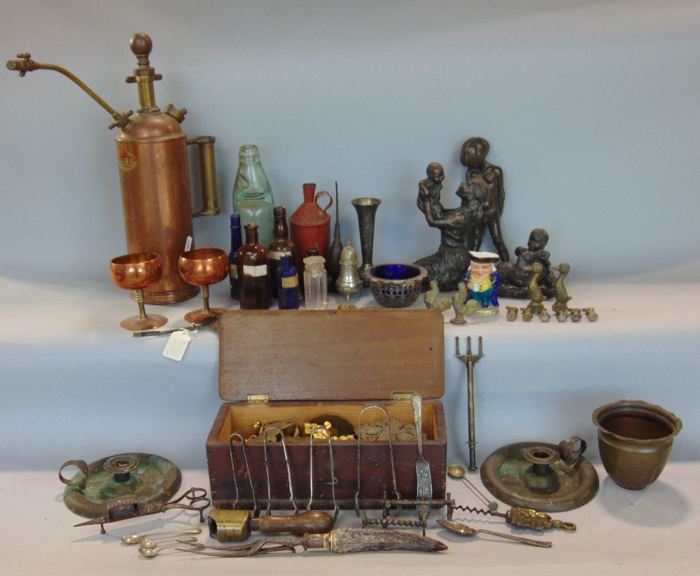 A box of miscellaneous items to include a vintage copper spraying pump, a collection of resin