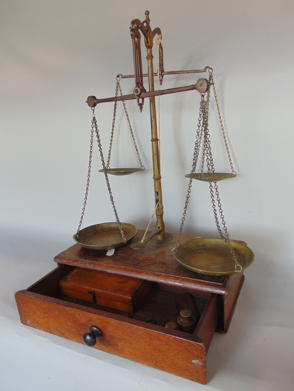 An unusual set of 19th century brass and mahogany twin balance scales, with four pans and weights - Image 2 of 2
