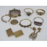 A collection of gold items to include four 9ct dress rings and a single cufflink, etc, 17.3g total