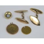 Mixed gold lot comprising a one dollar gold coin dated 1863 (drilled), a further mounted gold