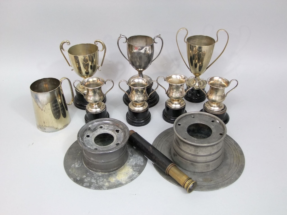 A mixed metalware lot to include two antique pewter ink stands, a collection of silver plated