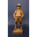 A Goldscheider terracotta figure of a standing jockey with moulded and impressed marks to base